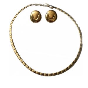 Vintage 2 tone gold necklace with matching clip on earrings